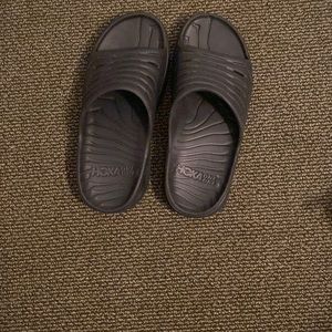 Almost brand new hoka one one slides